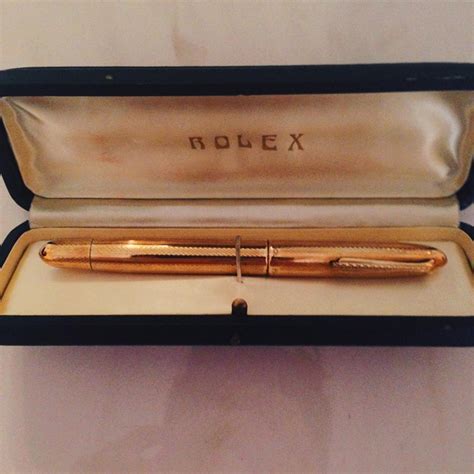 penna biro rolex laminata oro